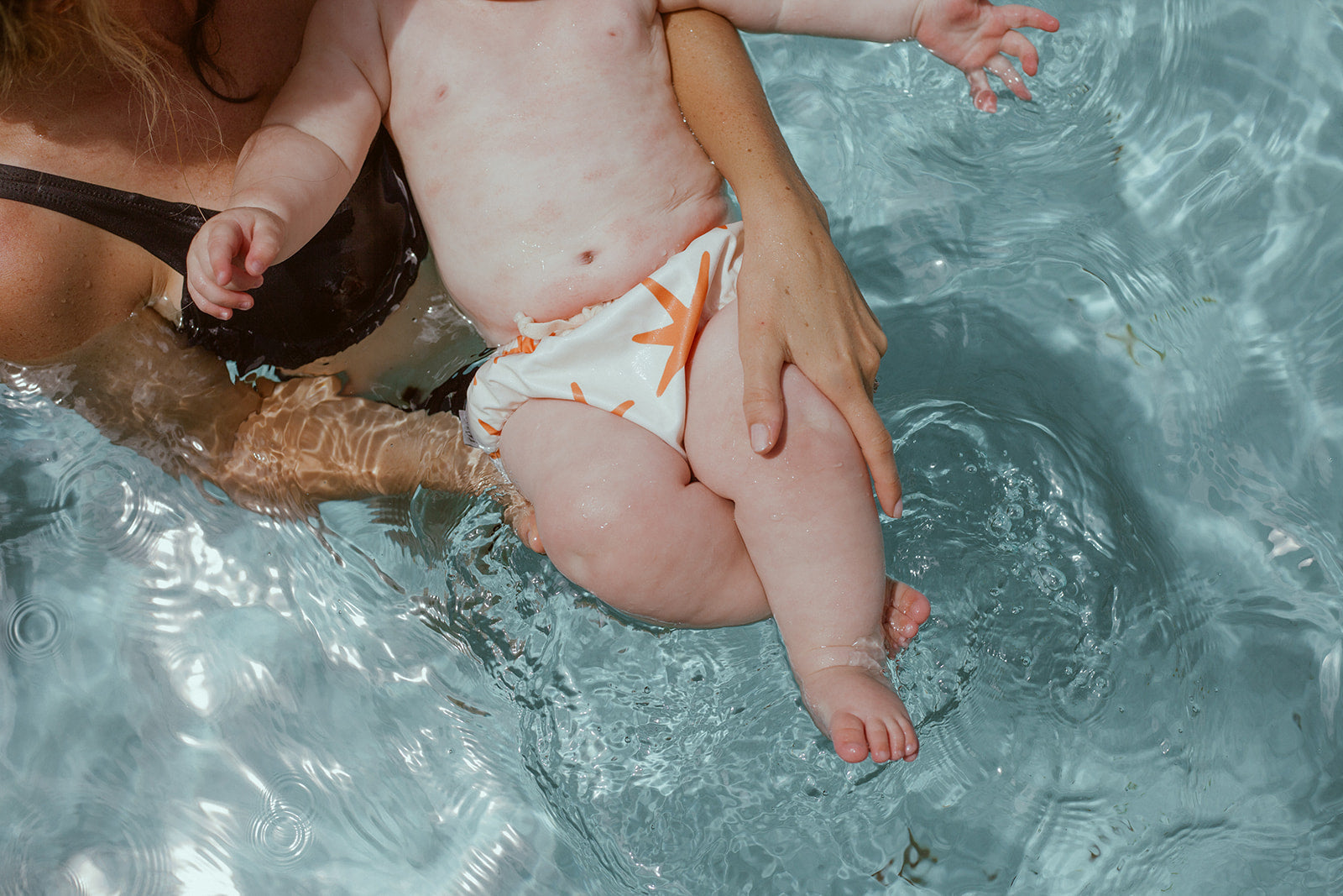 Kids at the beach with Pekpi swimwear and accessories