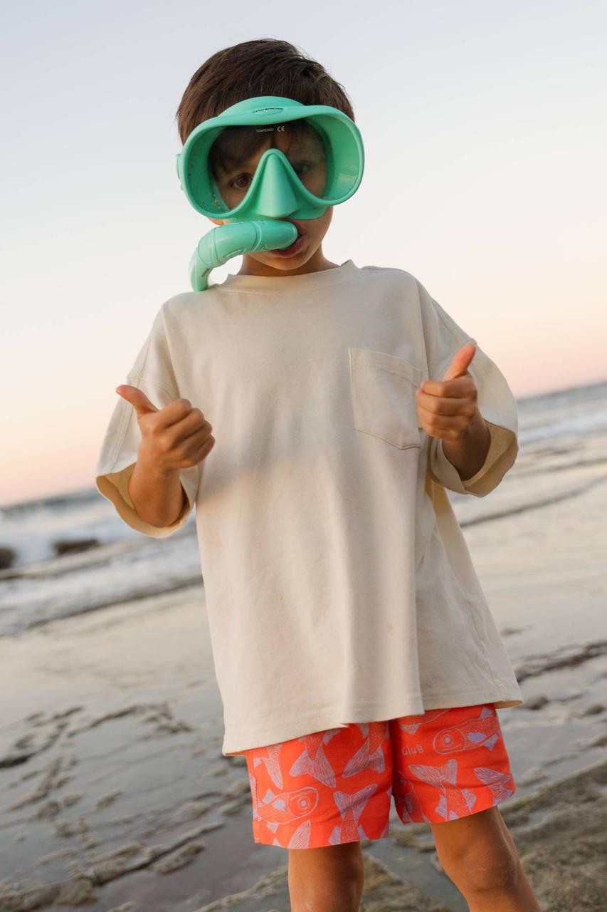 Big Glub Shorts - boy with snorkel thumbs up at beach