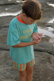 Sea Tee Green - boy exploring rock pools