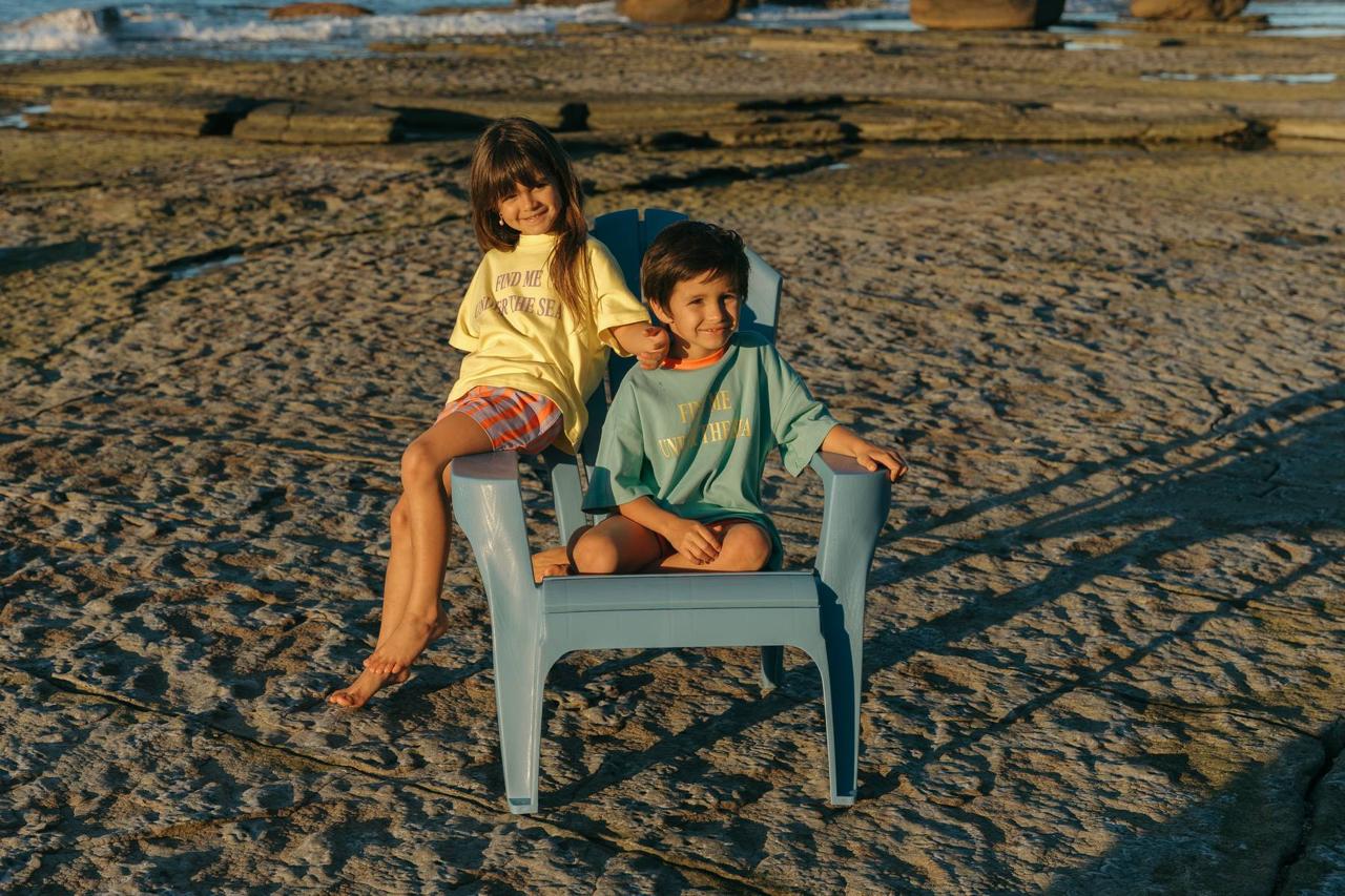 Sea Tee Crop Yellow - kids on beach chair with Sea Tee Green