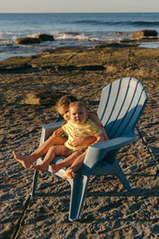 Pipi Shorts - siblings on beach chair golden hour