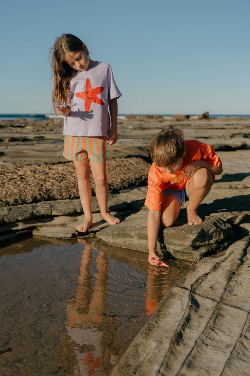 Aqua Shorts - kids exploring rock pools at beach