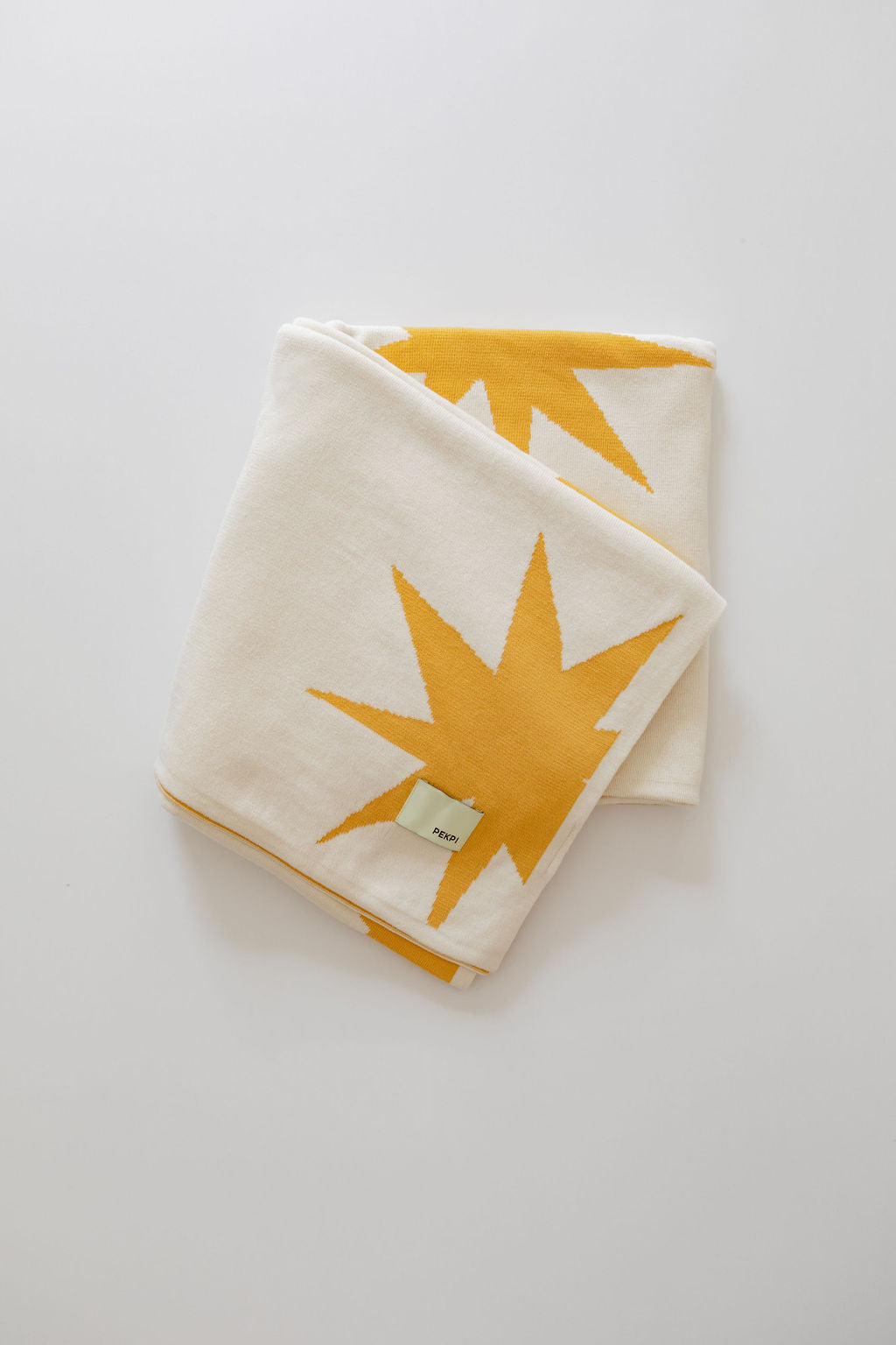 knitted organic baby blanket - sunburst