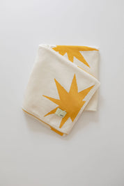 knitted organic baby blanket - sunburst