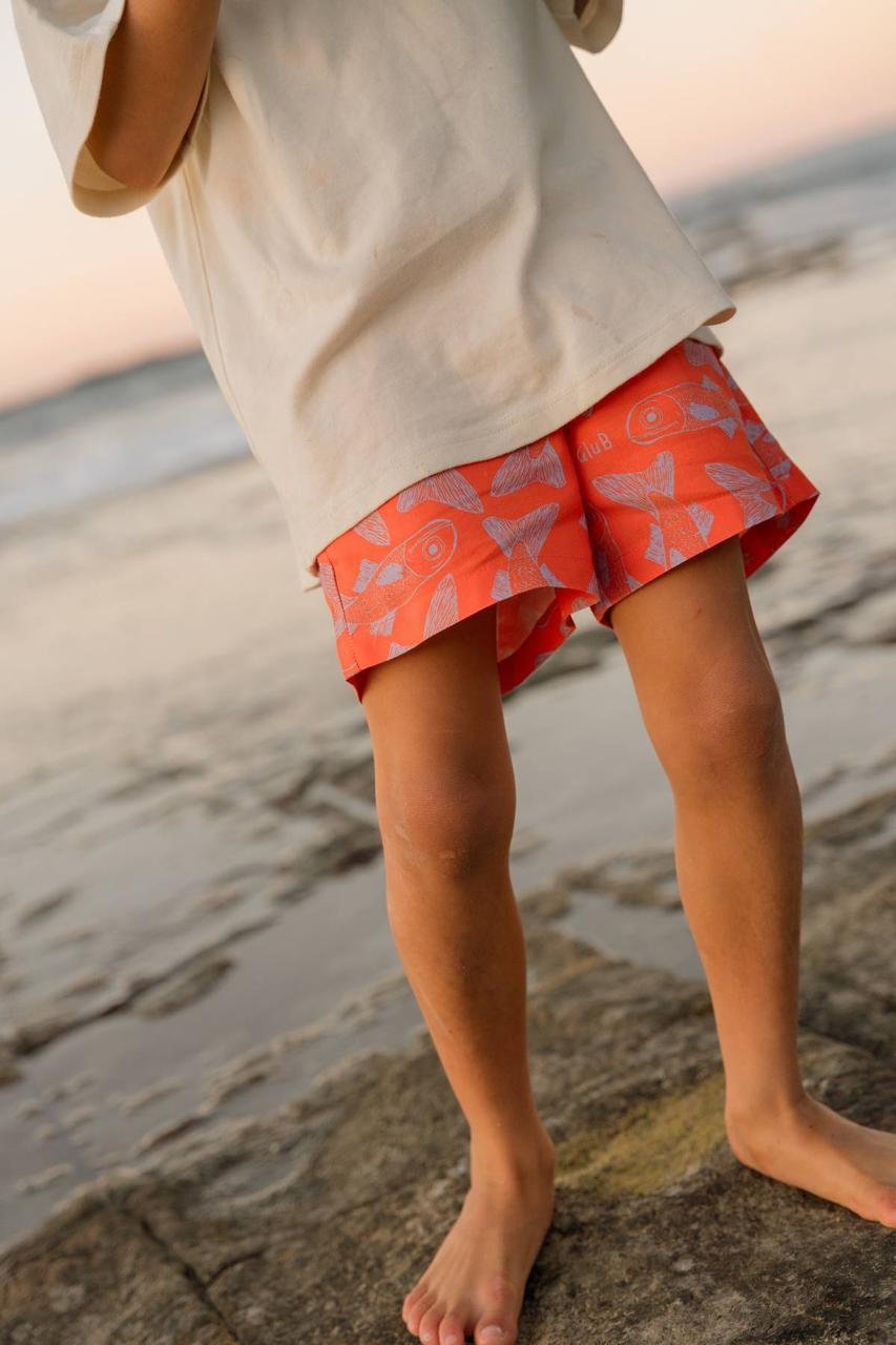 Big Glub Shorts - on child walking on rock pools at sunset
