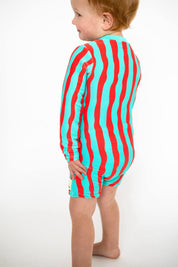 Toddler wearing Sea Kelp Aqua Shortie side view