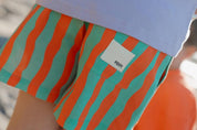 Aqua Shorts - Pekpi label detail close up