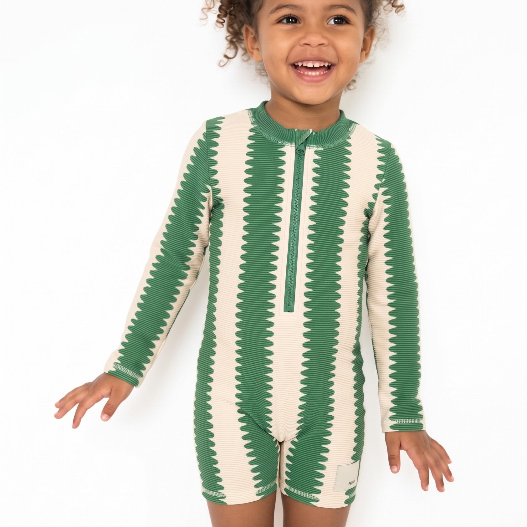 Shortie swimsuit in Cucumber Wobble, second view (AI-generated image matched to our sample)