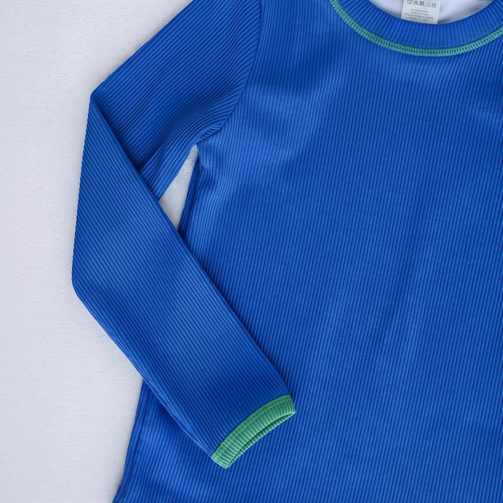 Boys rashie top in Bold Blueberry (AI-generated image matched to our sample)