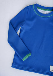 Boys rashie top in Bold Blueberry (AI-generated image matched to our sample)