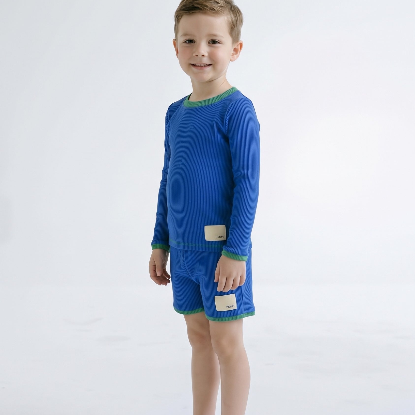 Boys swim shorts in Bold Blueberry, second view (AI-generated image matched to our sample)