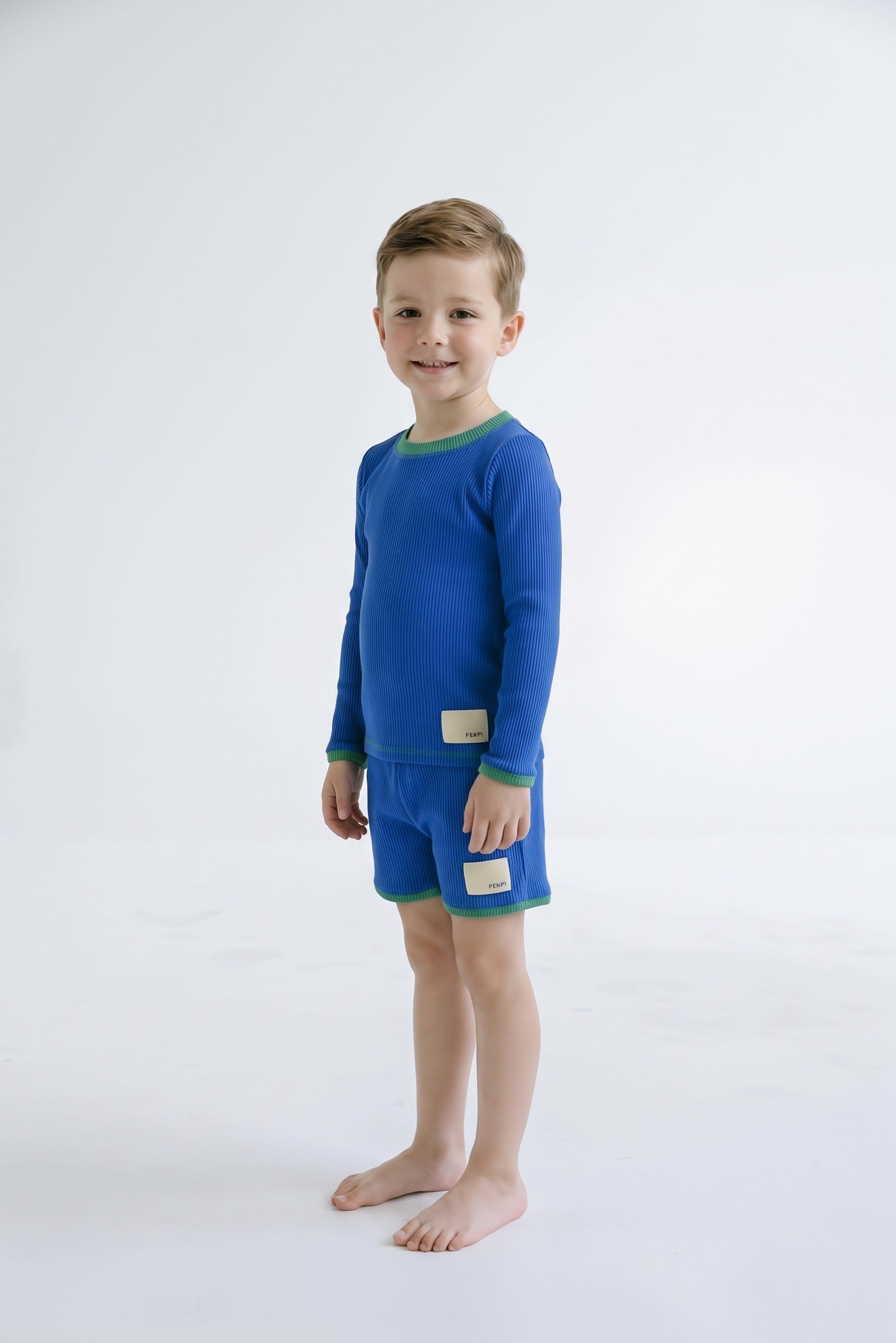 Boys swim shorts in Bold Blueberry, second view (AI-generated image matched to our sample)