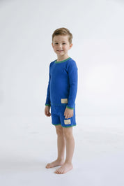 Boys rashie top and swim shorts in Bold Blueberry, second view (AI-generated image matched to our sample)