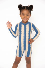 Shortie swimsuit in Blueberry Wobble, third view (AI-generated image matched to our sample)