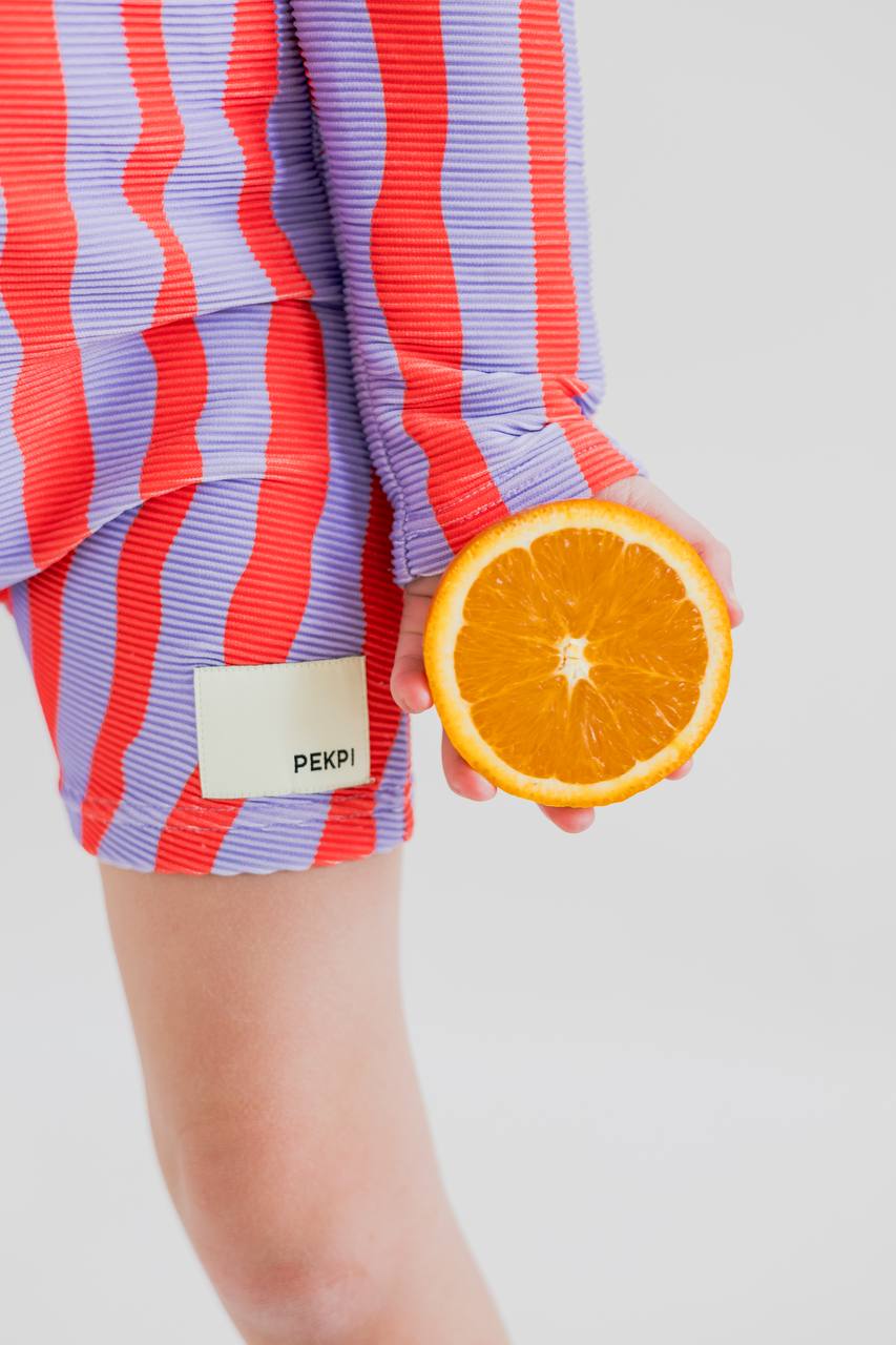 Sea Kelp Pipi Shortie close up of Pekpi label with orange