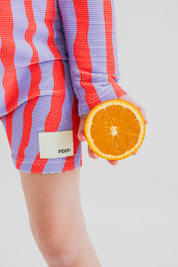 Sea Kelp Pipi Shortie close up of Pekpi label with orange
