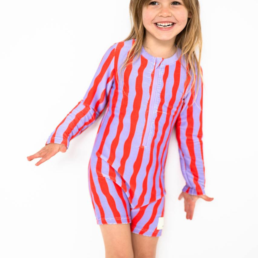 Girl smiling wearing Sea Kelp Pipi Shortie studio shot